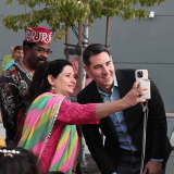 Josh Harder taking selfie with Valley neighbor at Durga Puja festival
