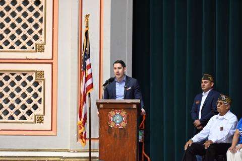 Rep. Harder at podium at Memorial Day Event